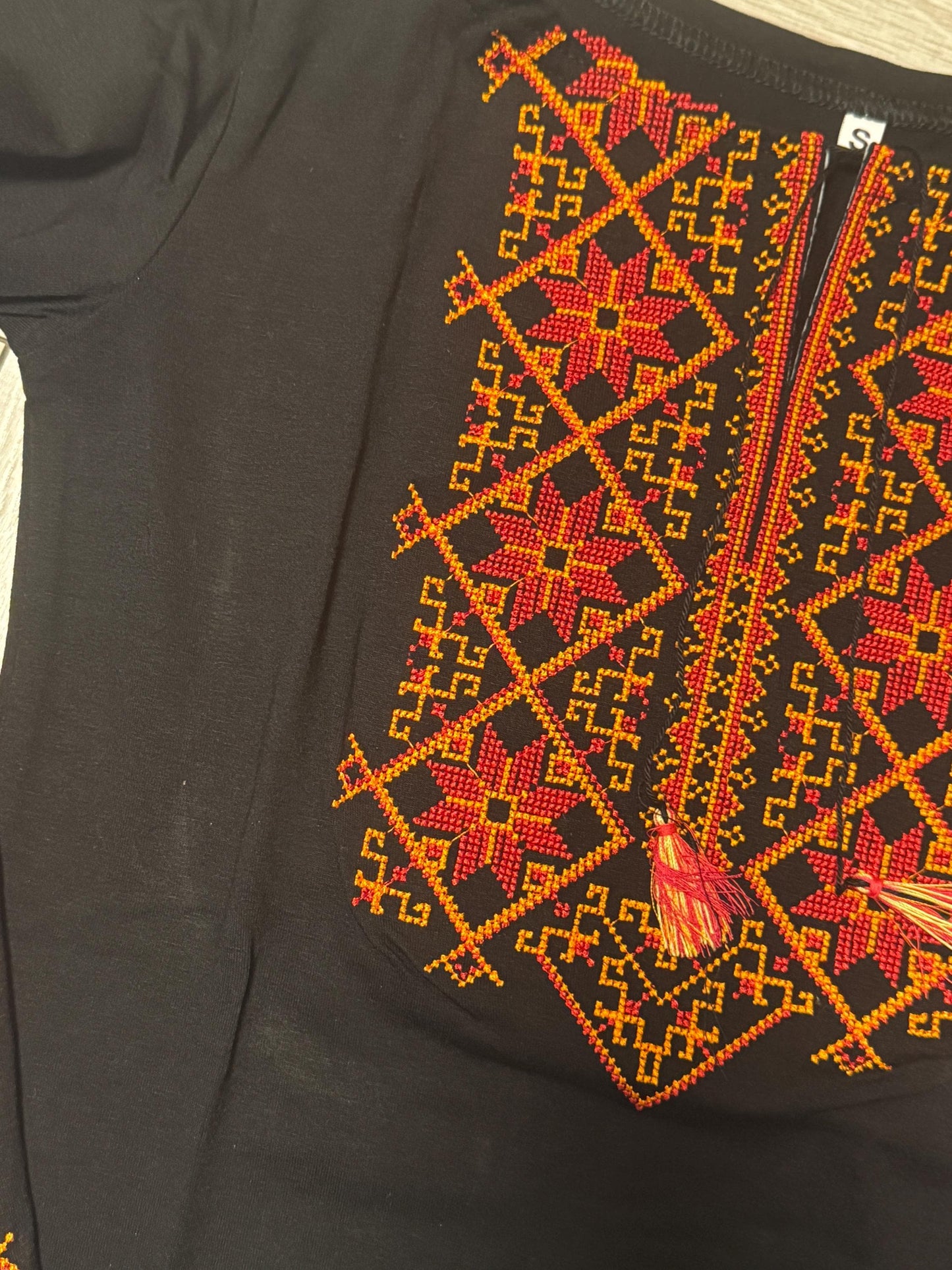 Modern Black Vyshyvanka Blouse with Red and Orange Geometric Embroidery