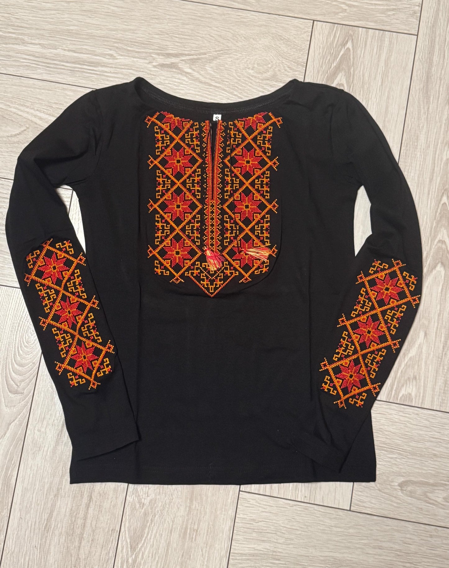 Modern Black Vyshyvanka Blouse with Red and Orange Geometric Embroidery