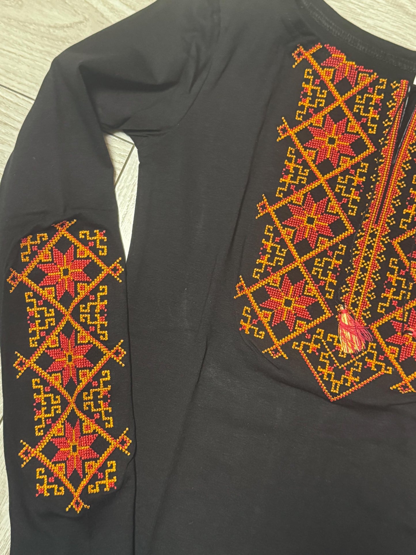 Modern Black Vyshyvanka Blouse with Red and Orange Geometric Embroidery